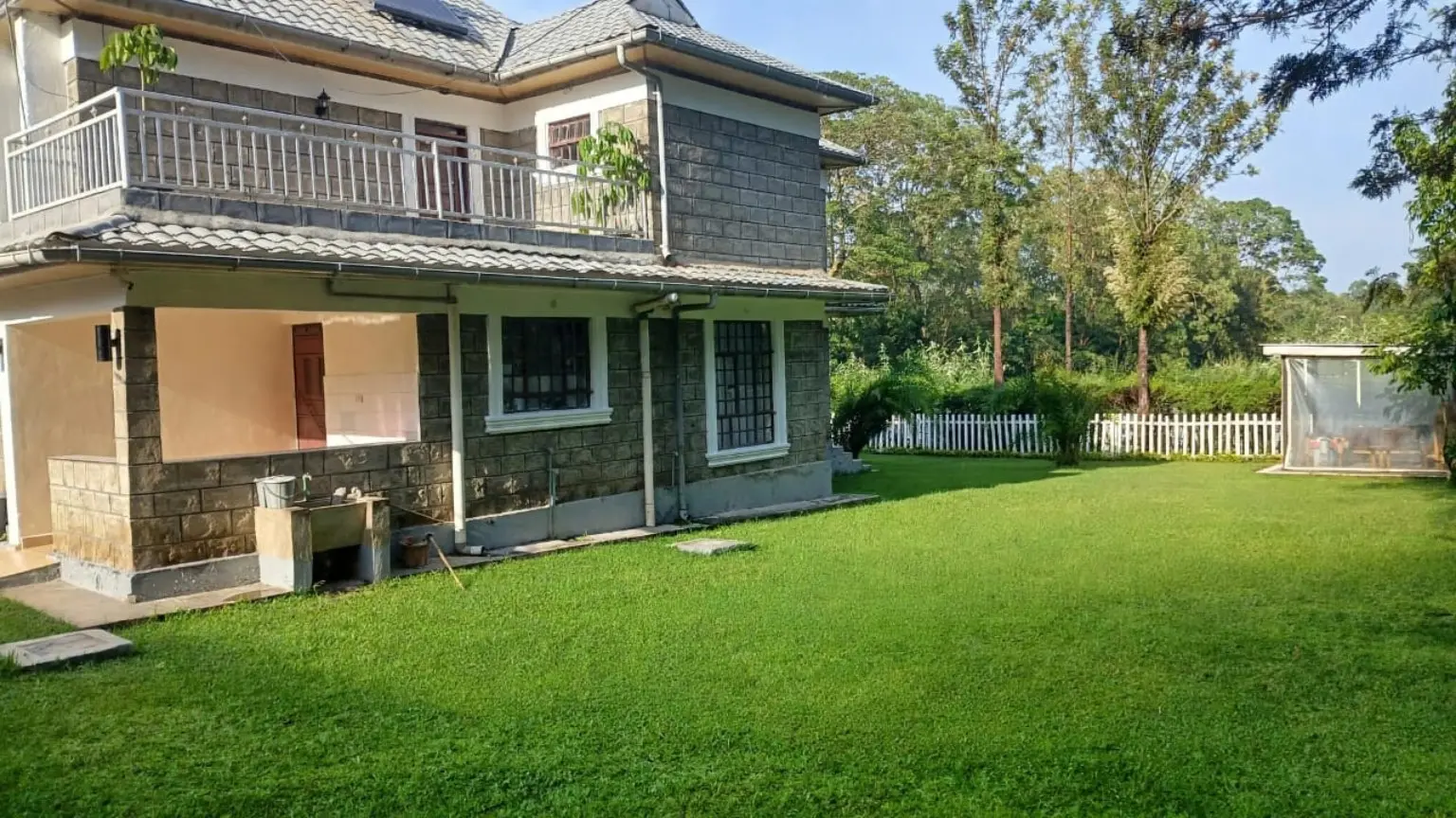 Spacious green lawn beside Siswi-The-Nest